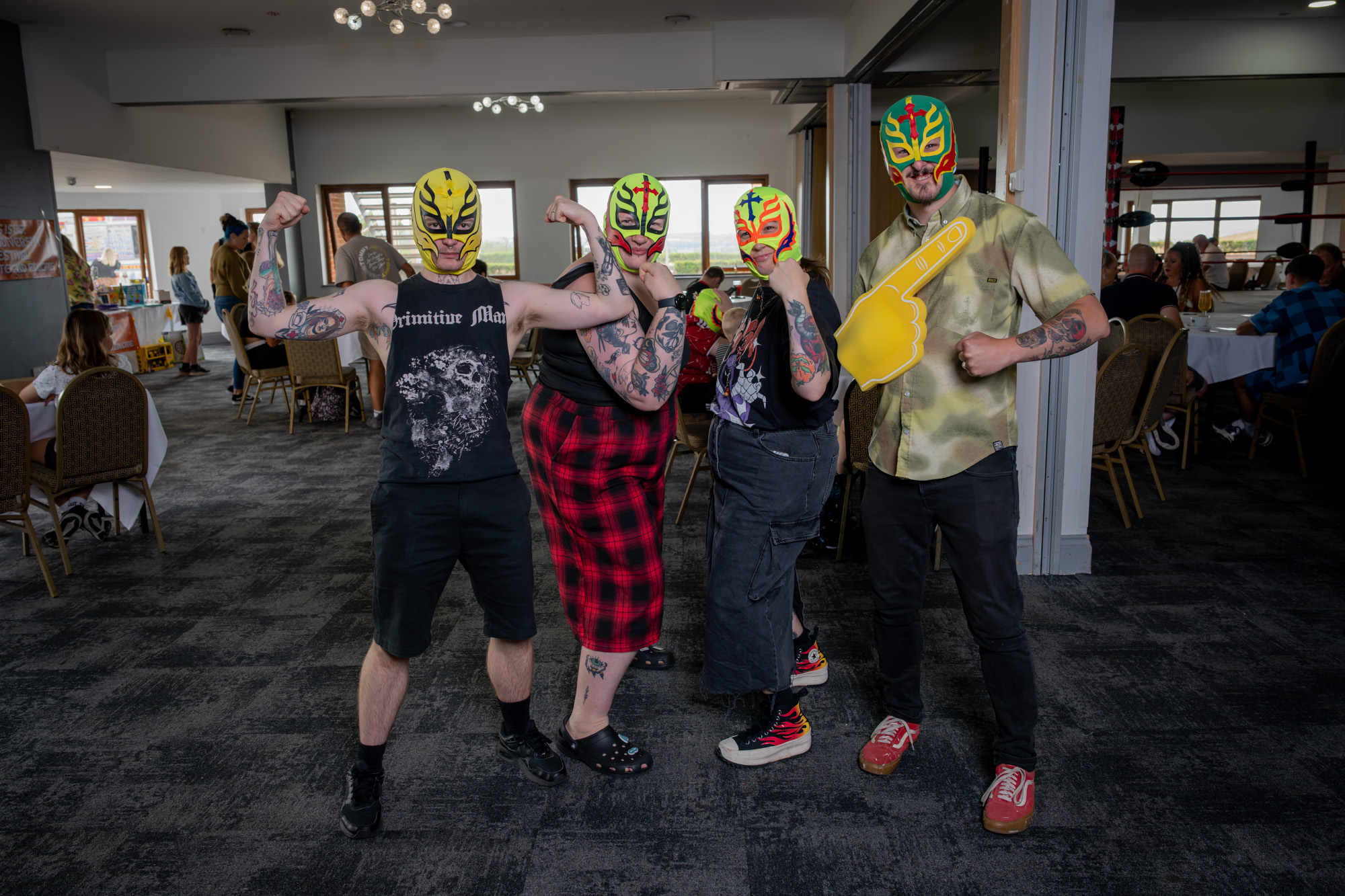 Fans cheering at REACH Wrestling’s Neuro Rumble event at Boringdon Park