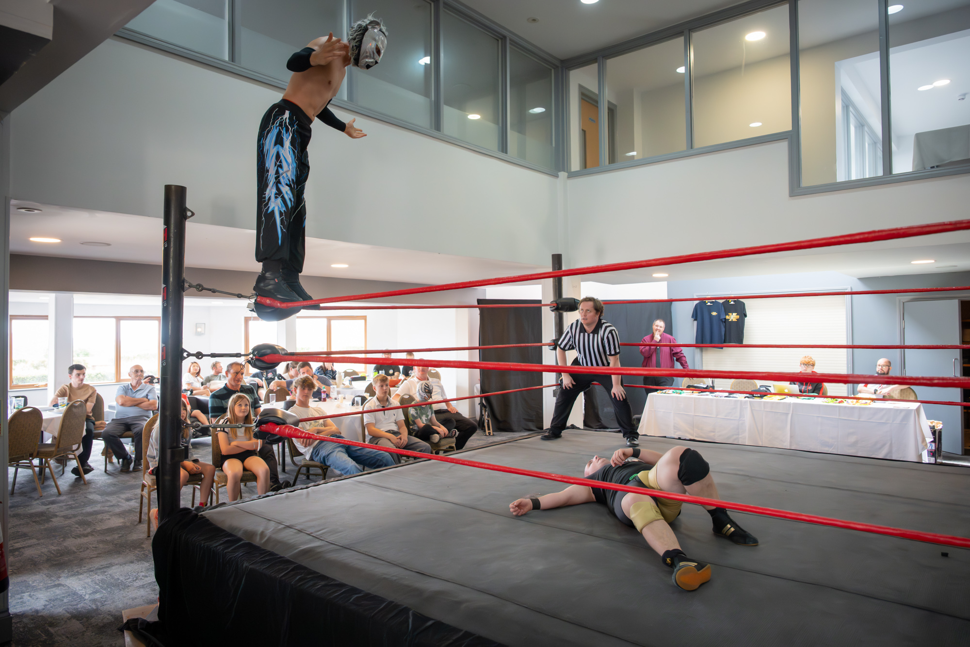 Leo Skye going aerial with a top-rope dive