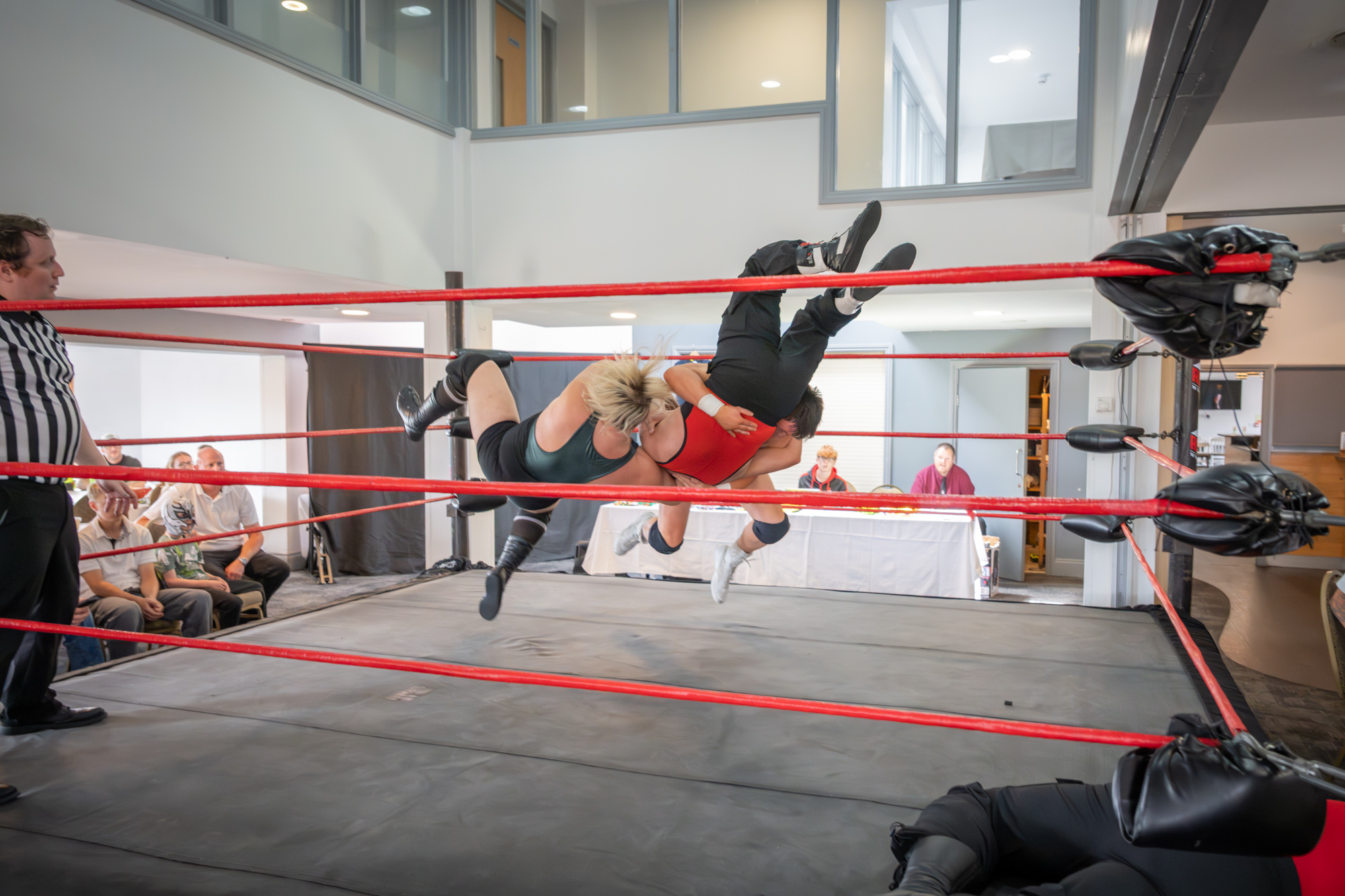 Cameron Merchant and Kain Chambers performing a suplex during Neuro Rumble