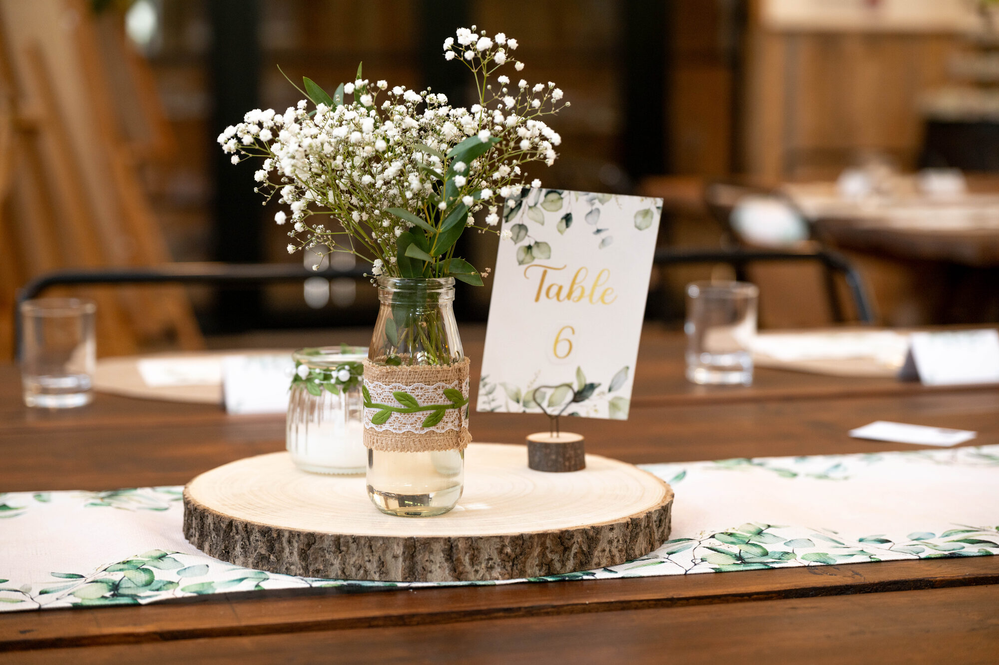 Rustic table centrepiece and decor at Valleyside Barn wedding