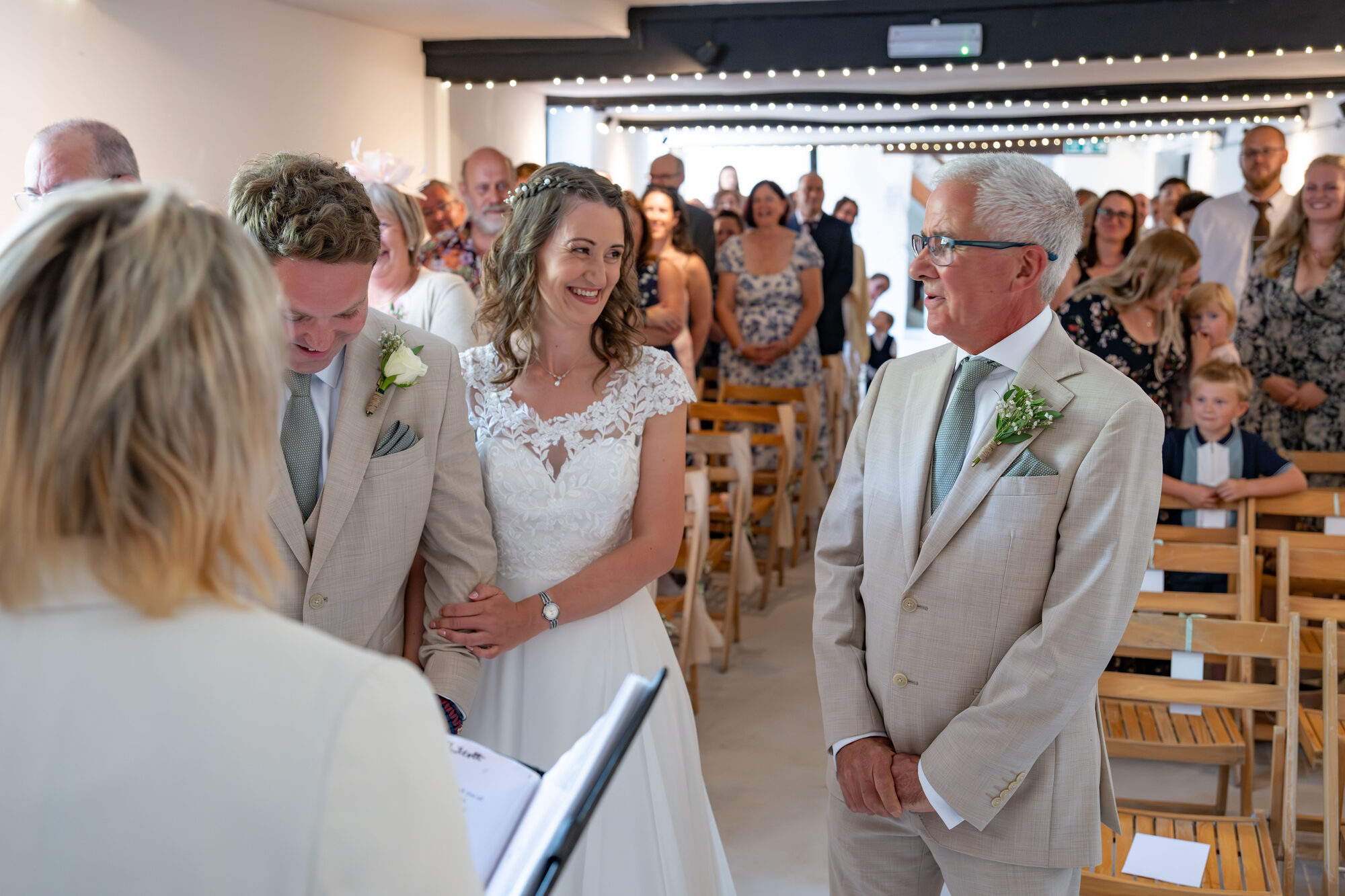 Bride walking into the ceremony with father