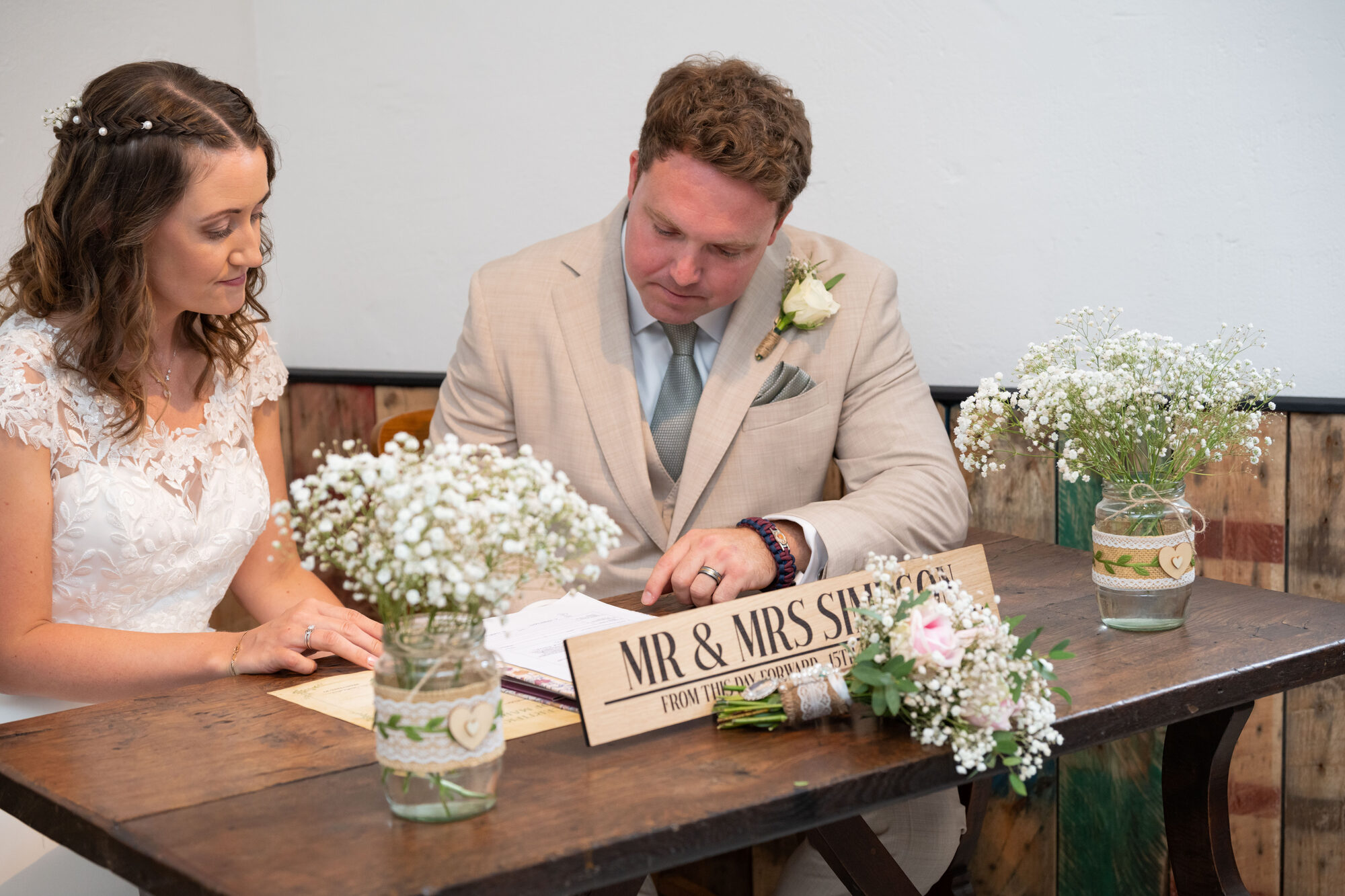 Signing of the register at Valleyside Barn wedding ceremony
