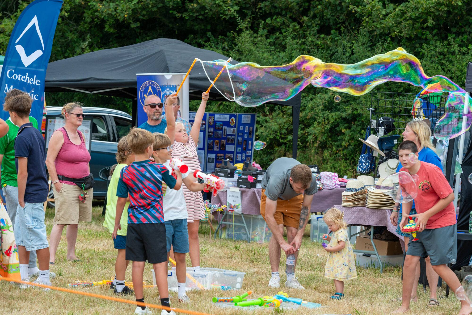 Children playing with bubbles at LCCP Show